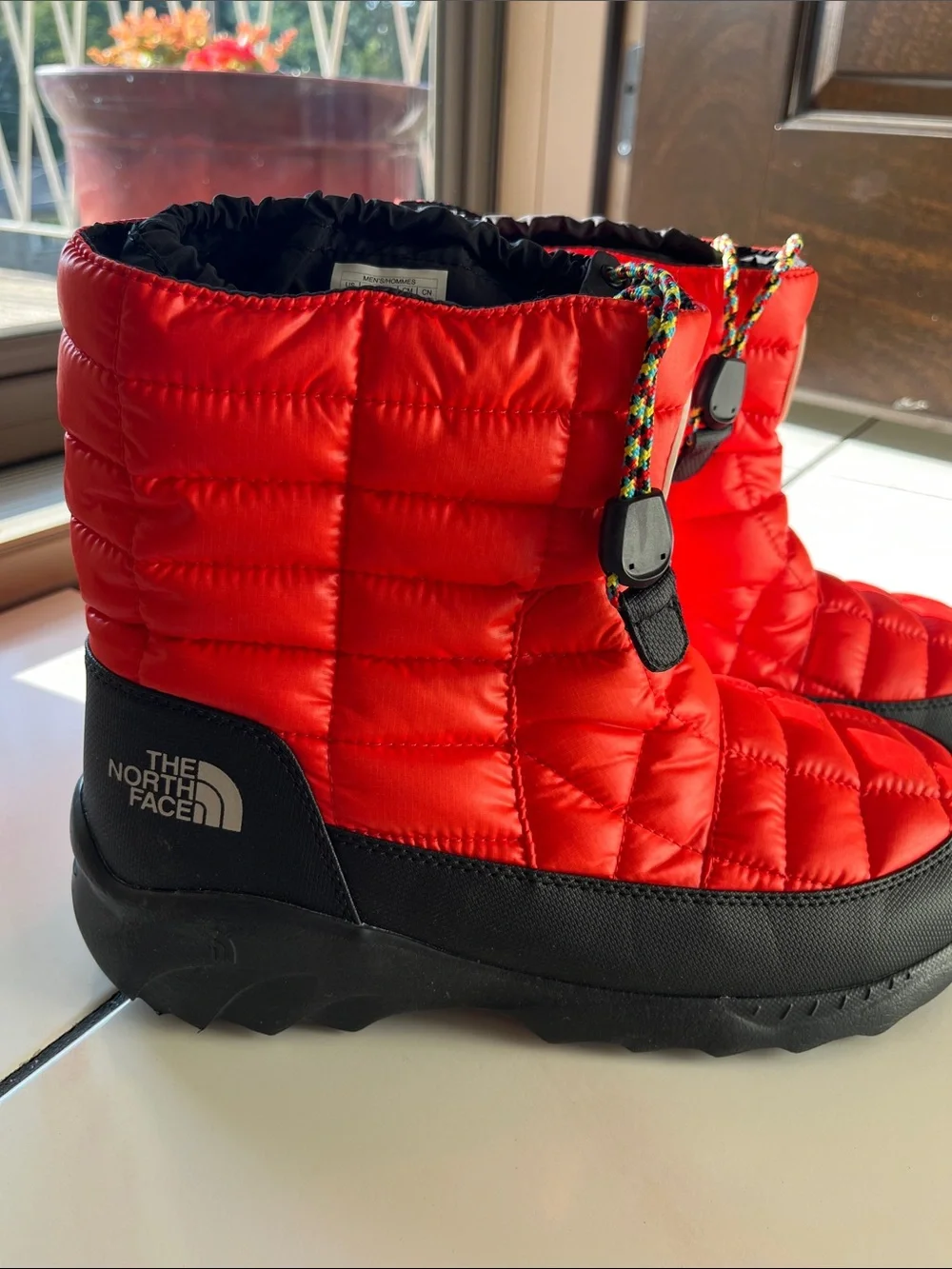 The North Face Men’s Red Puffer Winter Boots